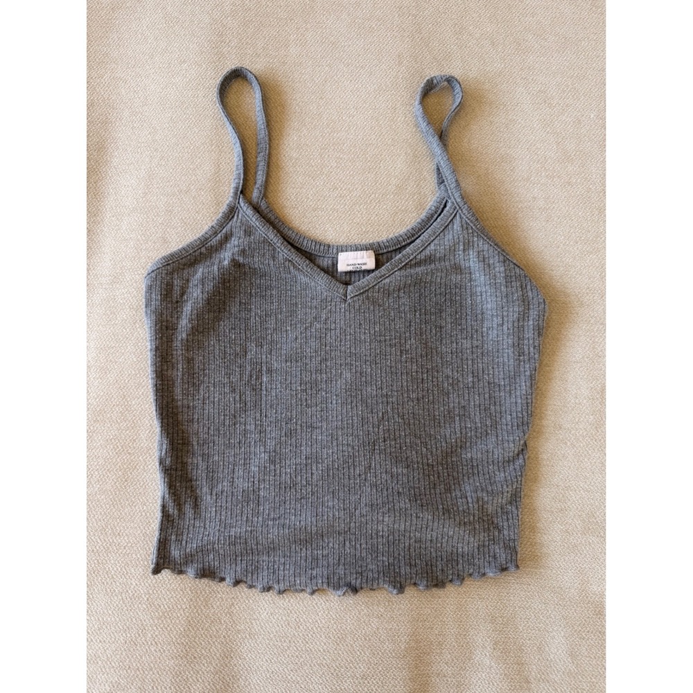 Grey Tank top with lightly ruffled trim at the bottom